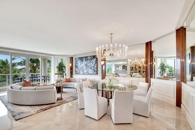 dining area with an inviting chandelier and floor to ceiling windows