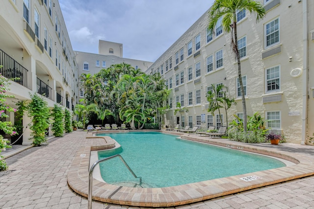 view of pool featuring a patio area