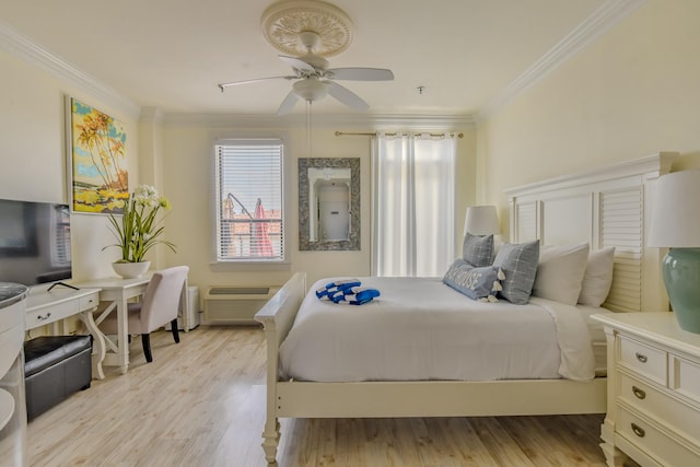 bedroom with ceiling fan, ornamental molding, a wall unit AC, and light hardwood / wood-style flooring