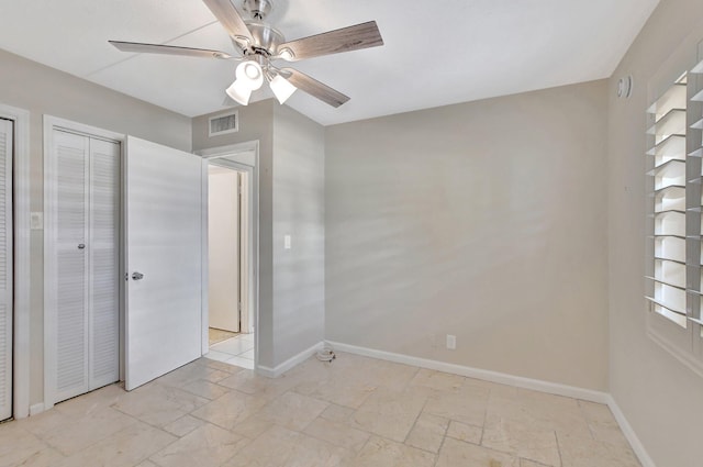 unfurnished bedroom with ceiling fan