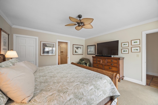 carpeted bedroom with crown molding, ceiling fan, and ensuite bath