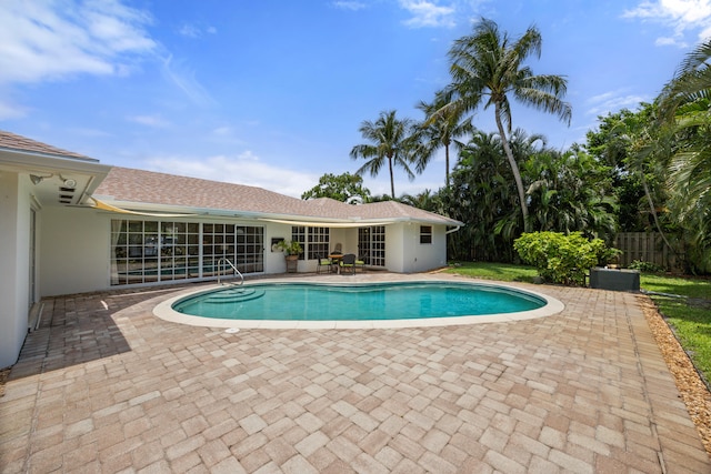 view of pool featuring a patio area