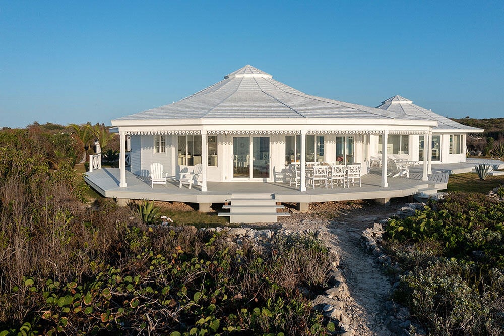 back of property featuring a wooden deck