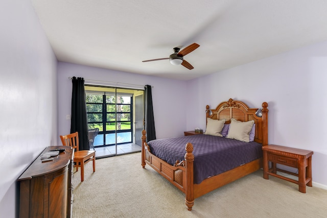 bedroom featuring access to outside, ceiling fan, and light carpet