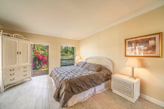 bedroom with access to exterior, ornamental molding, and light hardwood / wood-style flooring