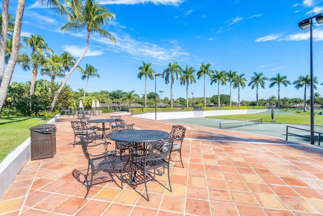 view of patio / terrace featuring tennis court