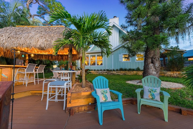 wooden terrace with a bar