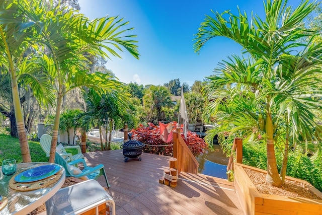 deck featuring a fire pit