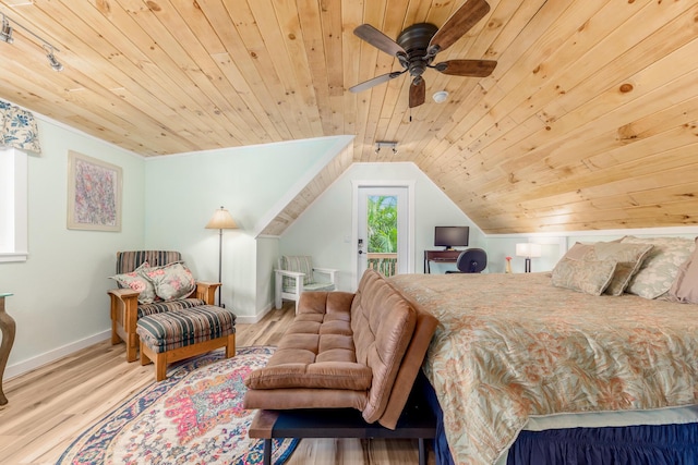 bedroom featuring wooden ceiling, lofted ceiling, light hardwood / wood-style floors, and ceiling fan