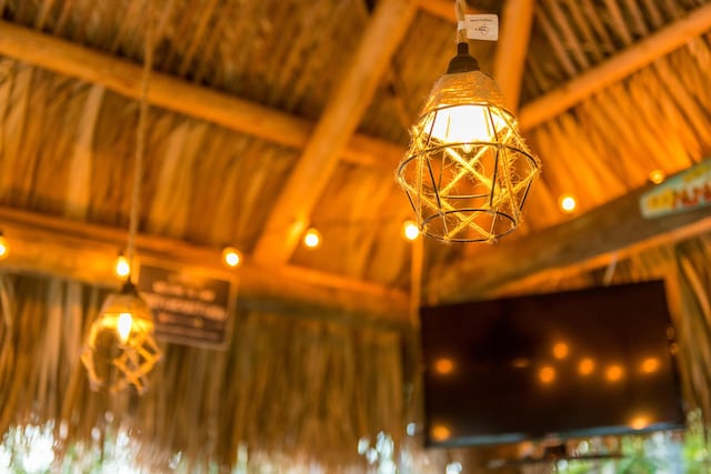 room details featuring wooden ceiling and beam ceiling