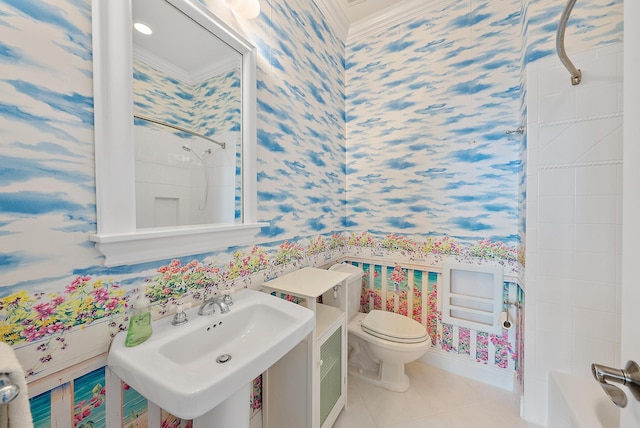 bathroom with sink, toilet, ornamental molding, and tile patterned flooring