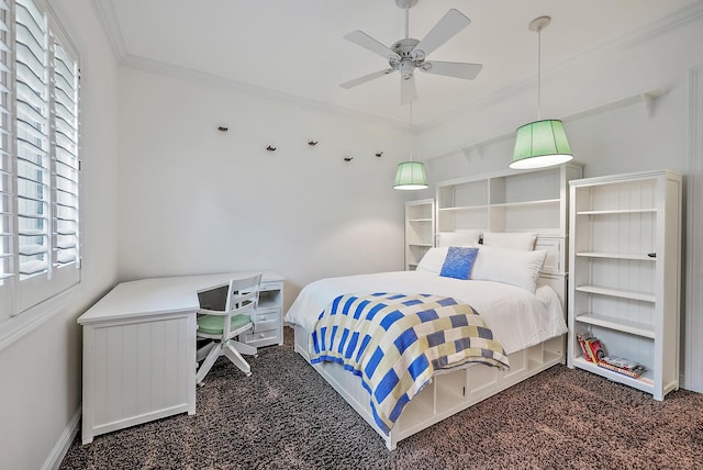 carpeted bedroom with ceiling fan and ornamental molding