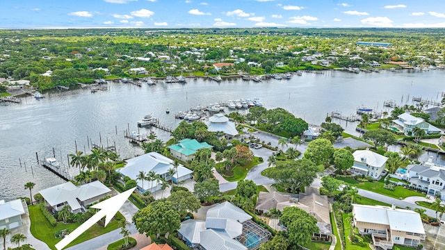 drone / aerial view with a water view