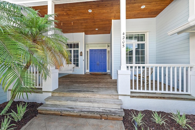 doorway to property with a porch