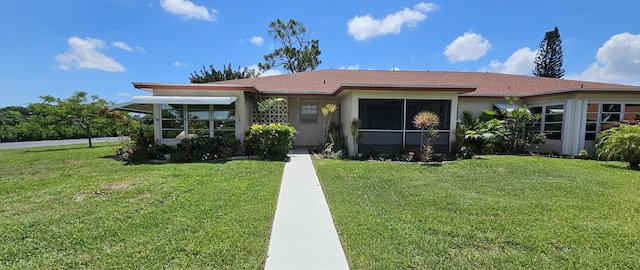 view of front facade with a front lawn