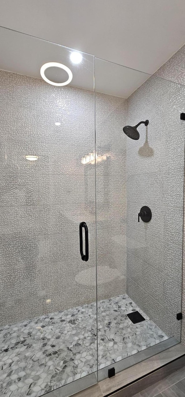 bathroom with an enclosed shower