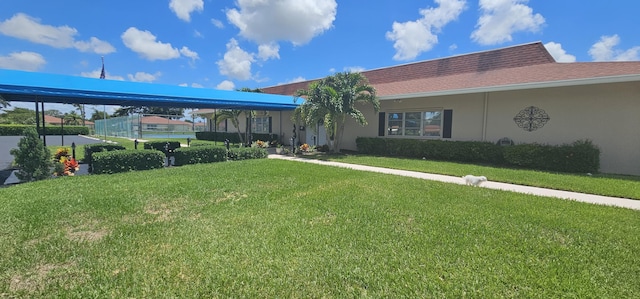 view of front of house with a front lawn