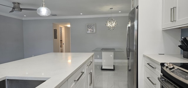 kitchen featuring white cabinetry, appliances with stainless steel finishes, decorative light fixtures, and ornamental molding