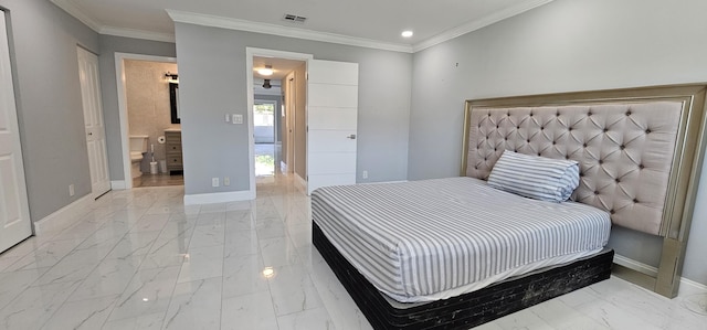 bedroom featuring ensuite bath and ornamental molding