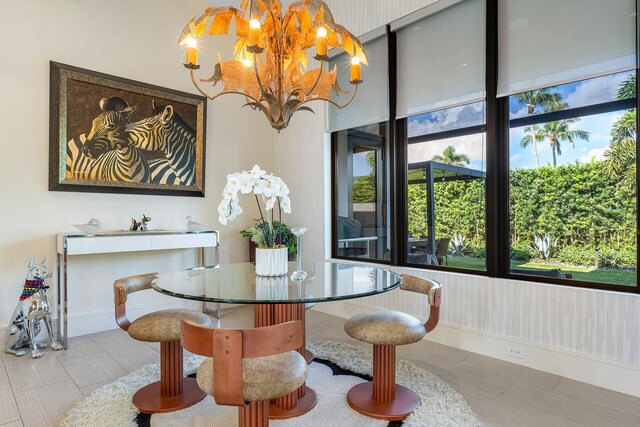 dining area featuring a chandelier