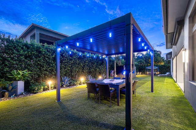 patio terrace at dusk with a lawn