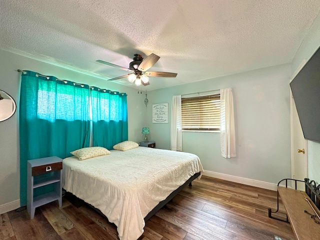 bathroom featuring tiled shower, tile floors, tile walls, vanity with extensive cabinet space, and toilet