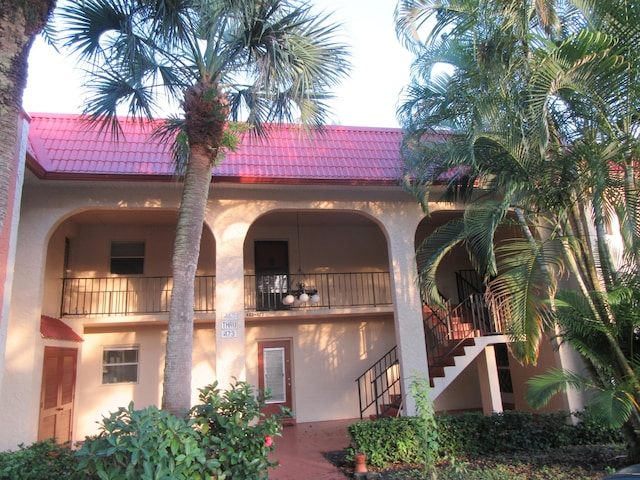 view of building exterior featuring stairs