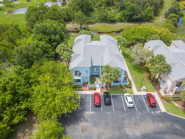 aerial view with a residential view and a water view