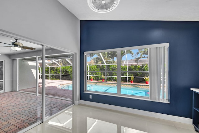 interior space featuring ceiling fan