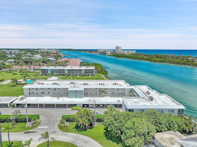 drone / aerial view with a water view