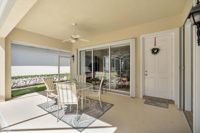 view of patio / terrace featuring ceiling fan