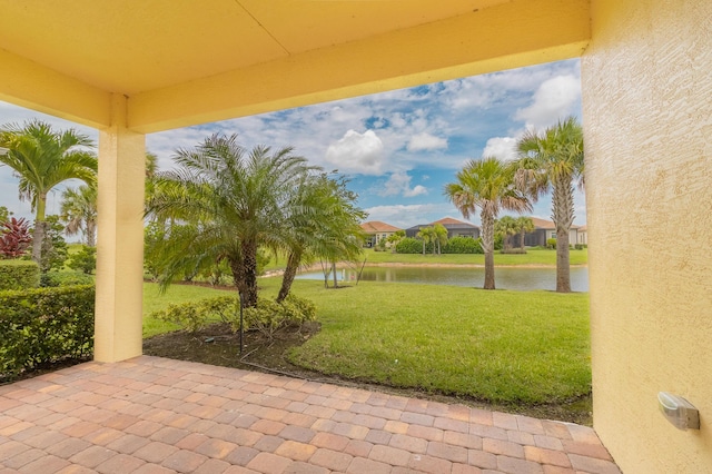 view of patio / terrace with a water view