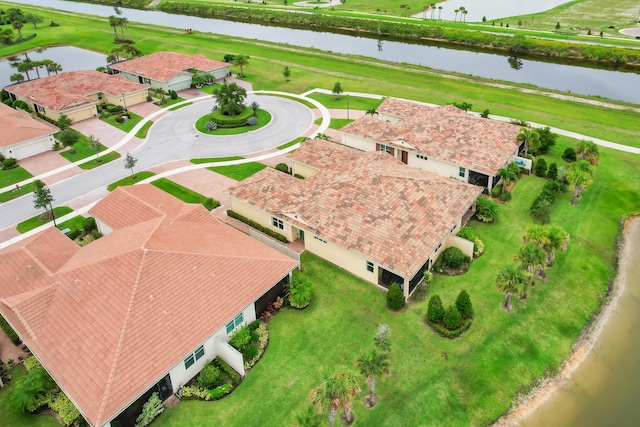 bird's eye view with a water view