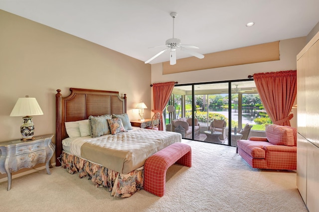 carpeted bedroom featuring ceiling fan, lofted ceiling, and access to outside