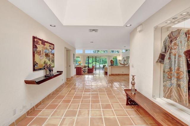 corridor featuring tile patterned flooring