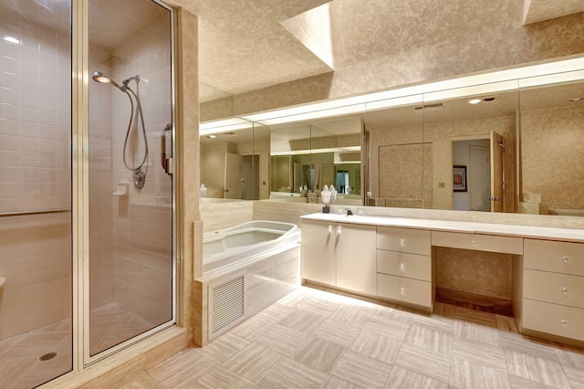 bathroom with vanity and walk in shower