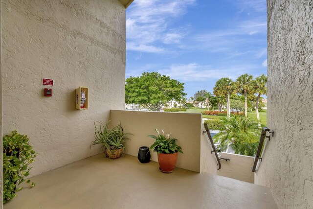 view of patio with a balcony