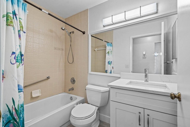 full bathroom with shower / bath combo, toilet, and vanity