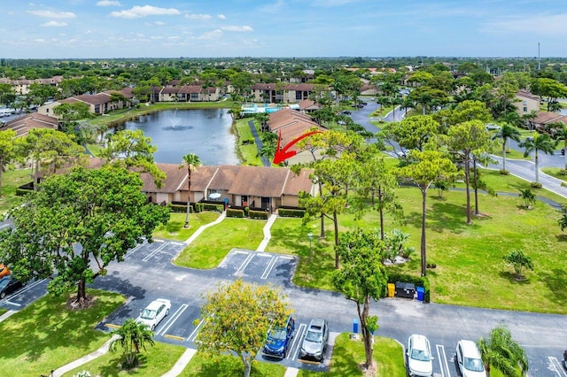 bird's eye view with a water view