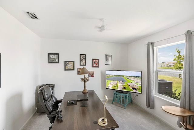 office area with ceiling fan and carpet flooring