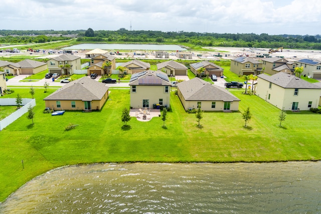 drone / aerial view featuring a water view