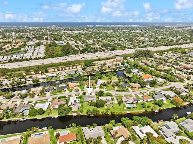 drone / aerial view with a water view