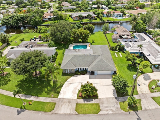 bird's eye view with a water view