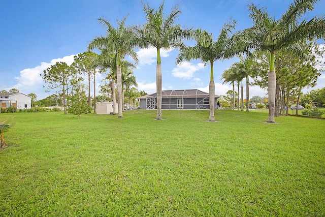 view of yard featuring a lanai