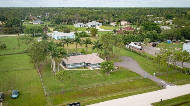 drone / aerial view with a view of trees