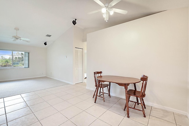 dining room with lofted ceiling, visible vents, ceiling fan, and baseboards