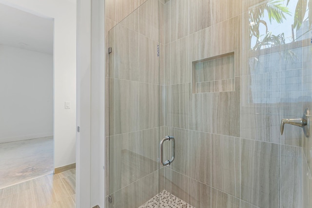 bathroom featuring walk in shower