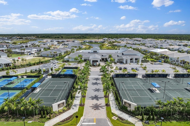 birds eye view of property with a residential view