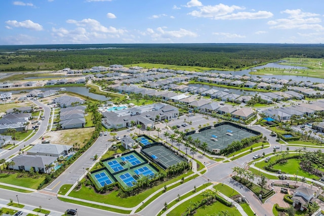 birds eye view of property with a water view