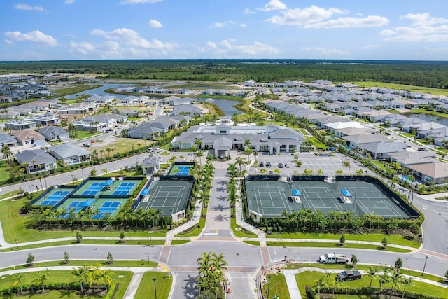 bird's eye view with a residential view and a water view